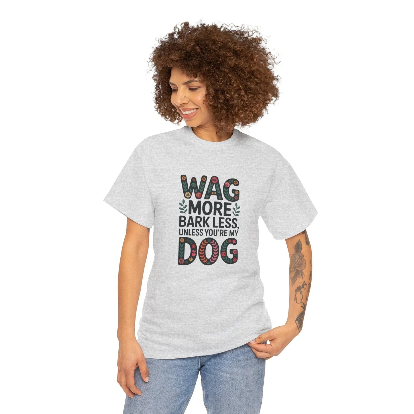 Woman wearing a gray dog lover t-shirt with 'Wag More Bark Less Unless You're My Dog' text.