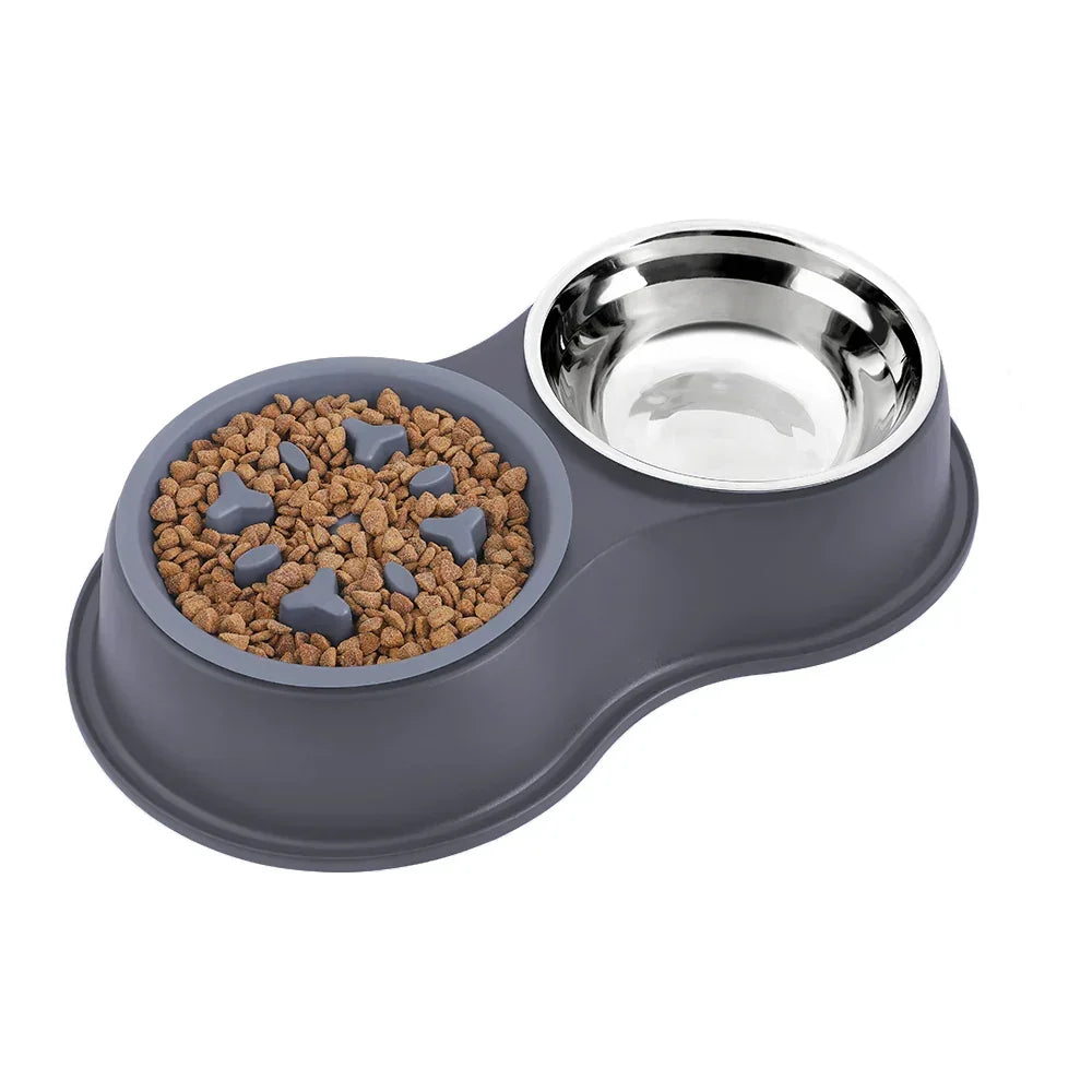 Grey double dog bowl with slow feeder and stainless steel water bowl, on white background